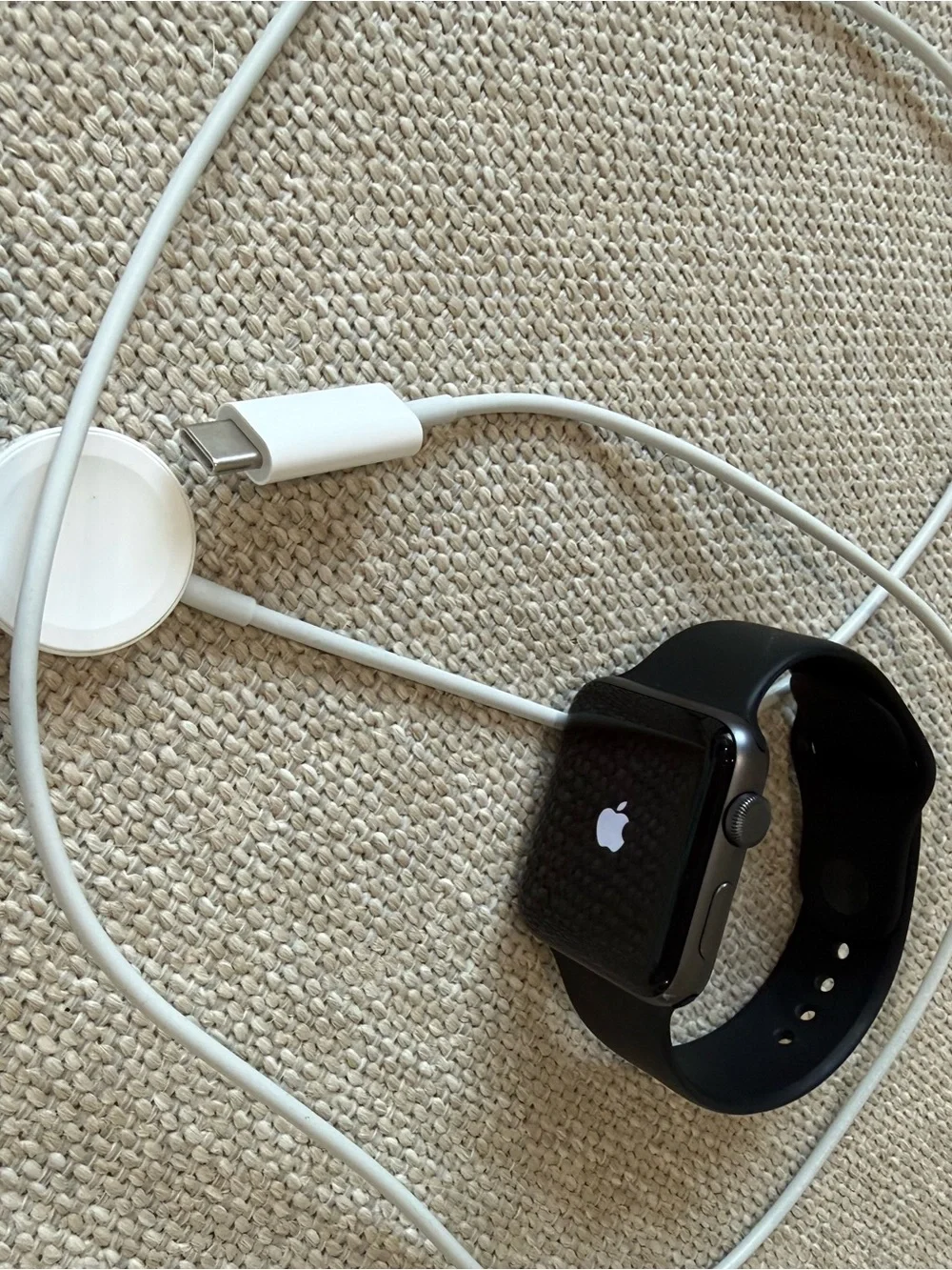 Apple Watch in Black with White Magnetic Charger